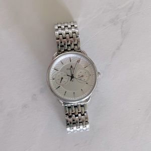 Women’s silver Fossil watch